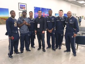 Navy football team members stopped by before the Armed Forces Bowl